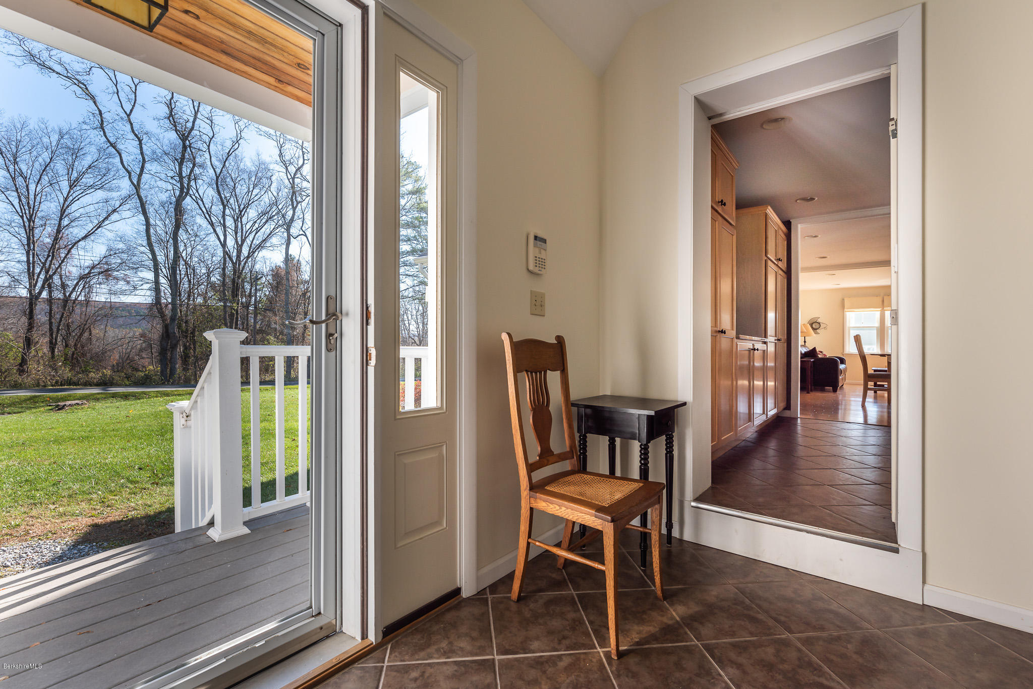 31 Interlaken Road Stockbridge, MA 01266 - Photo 5 of 34 a view of a porch with chairs and backyard
