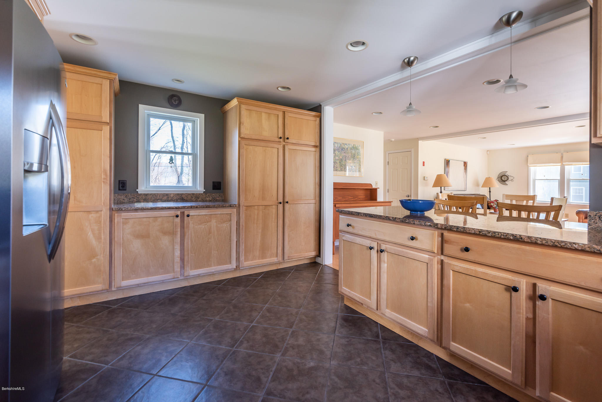 31 Interlaken Road Stockbridge, MA 01266 - Photo 8 of 34 a spacious bathroom with a granite countertop sink and a mirror