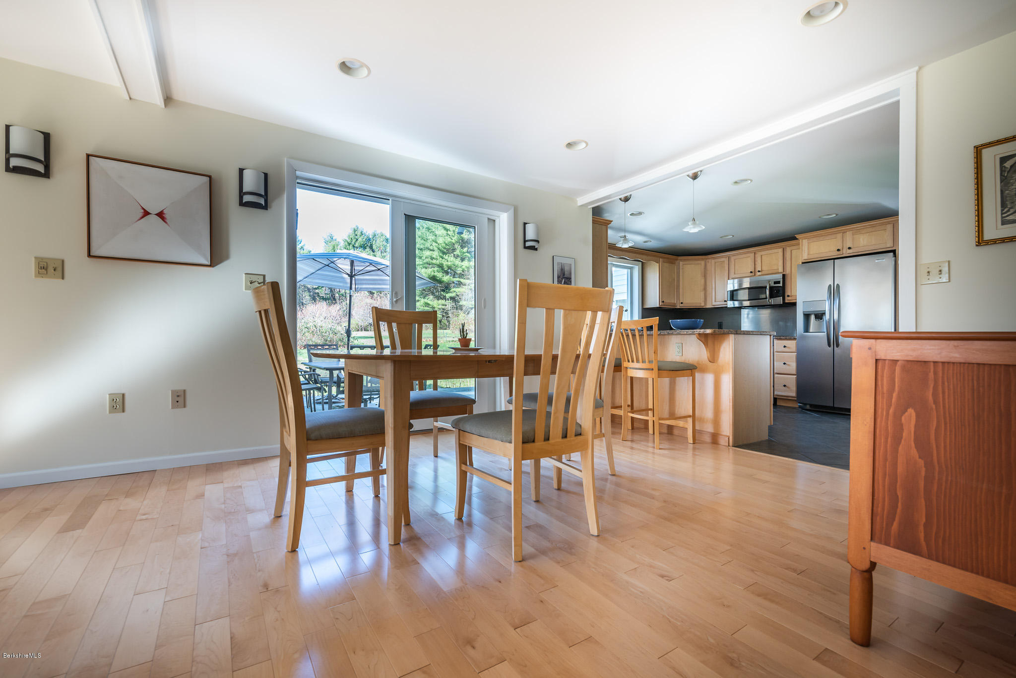 31 Interlaken Road Stockbridge, MA 01266 - Photo 9 of 34 a view of a dining room with furniture and wooden floor