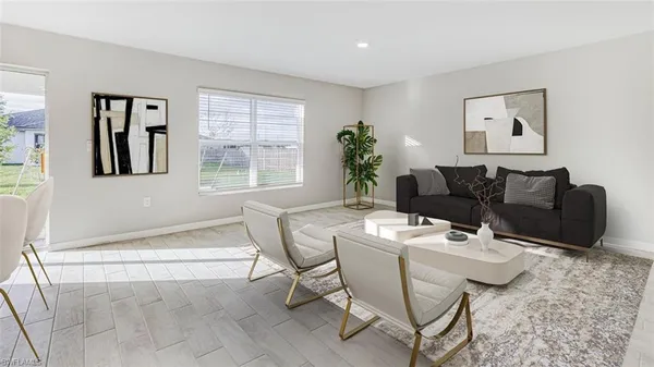 a living room with furniture and window