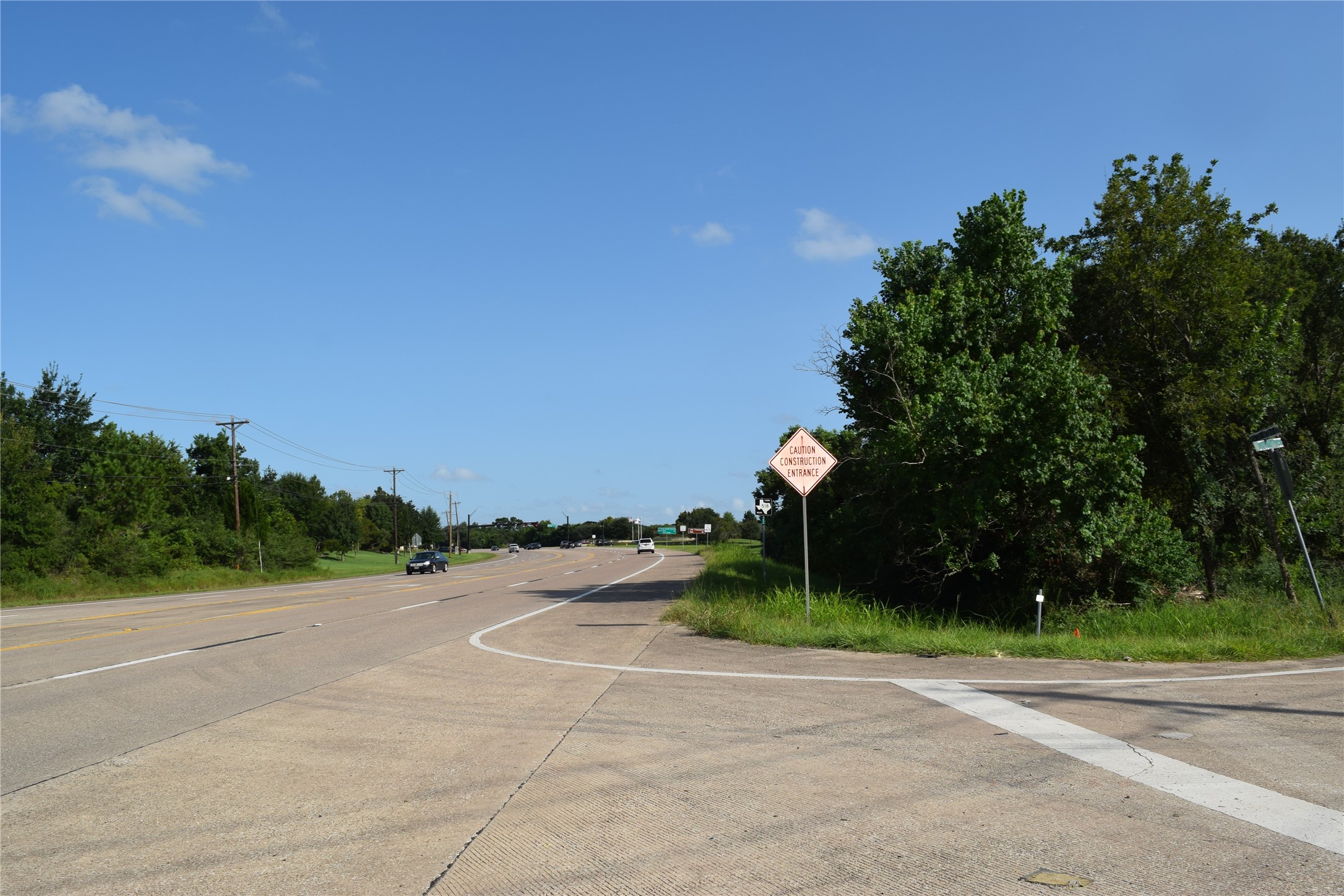 2304 Old Road Friendswood, TX 77546 - Photo 4 of 10 a backyard of a house with lots of green space and trees
