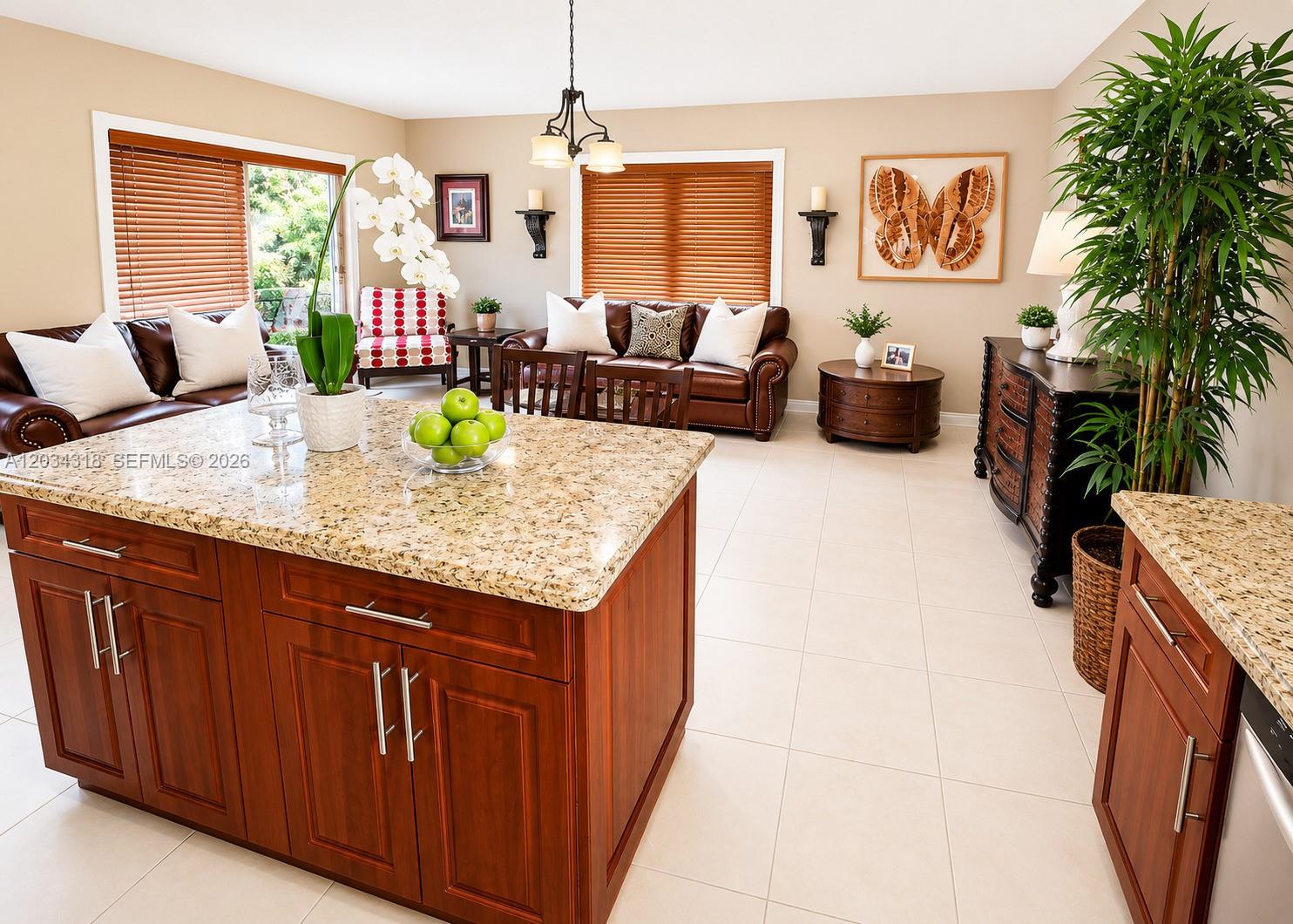 14856 Southwest 179th Street Miami, FL 33187 - Photo 13 of 33 a living room with granite countertop furniture and a wooden floor