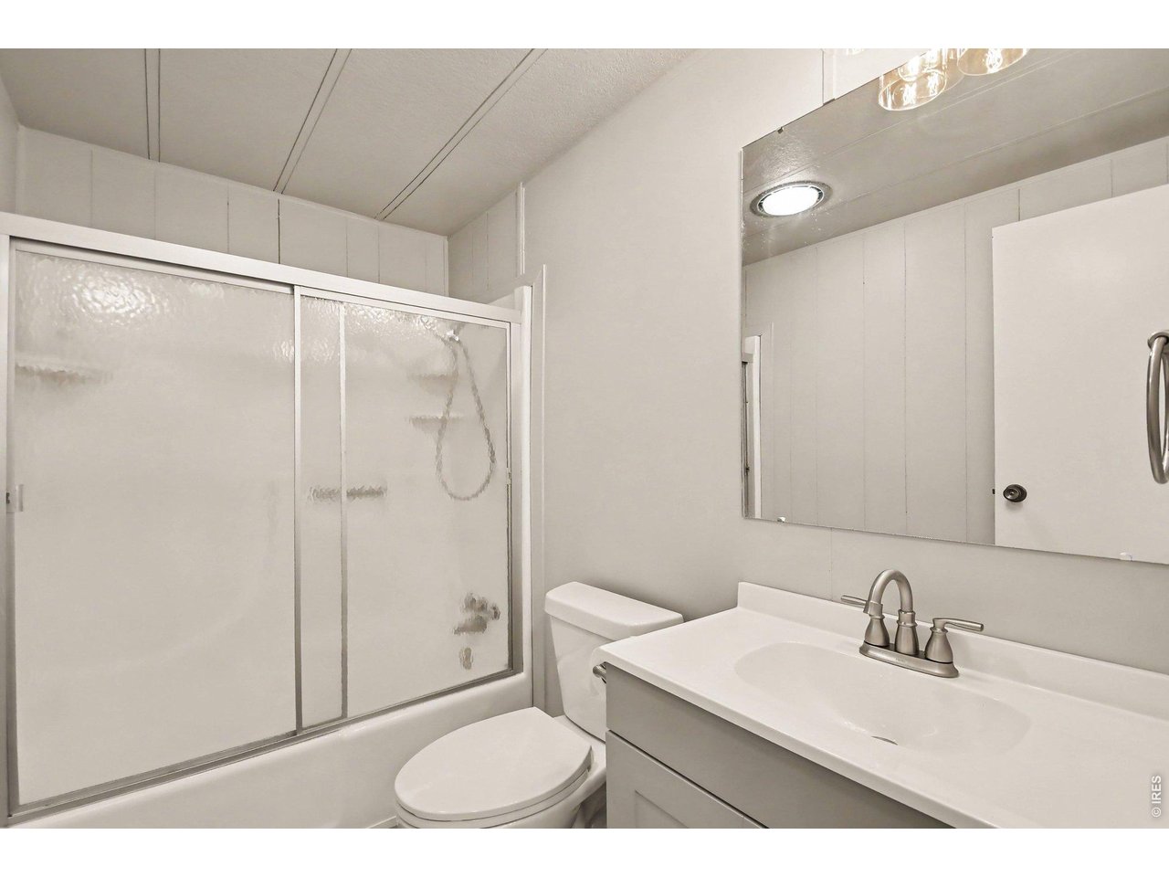 8317 6th Street Wellington, CO 80549 - Photo 15 of 21 Updated full shared bathroom