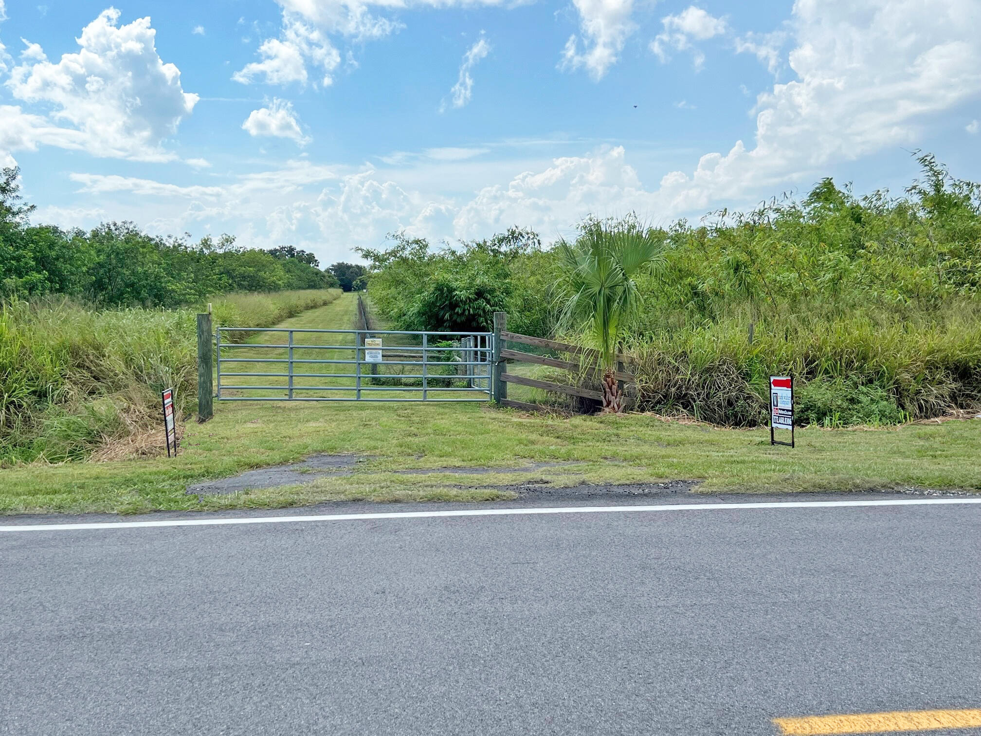 1375 South Header Canal Road Fort Pierce, FL 34945 - Photo 3 of 12 Frt w signs 2