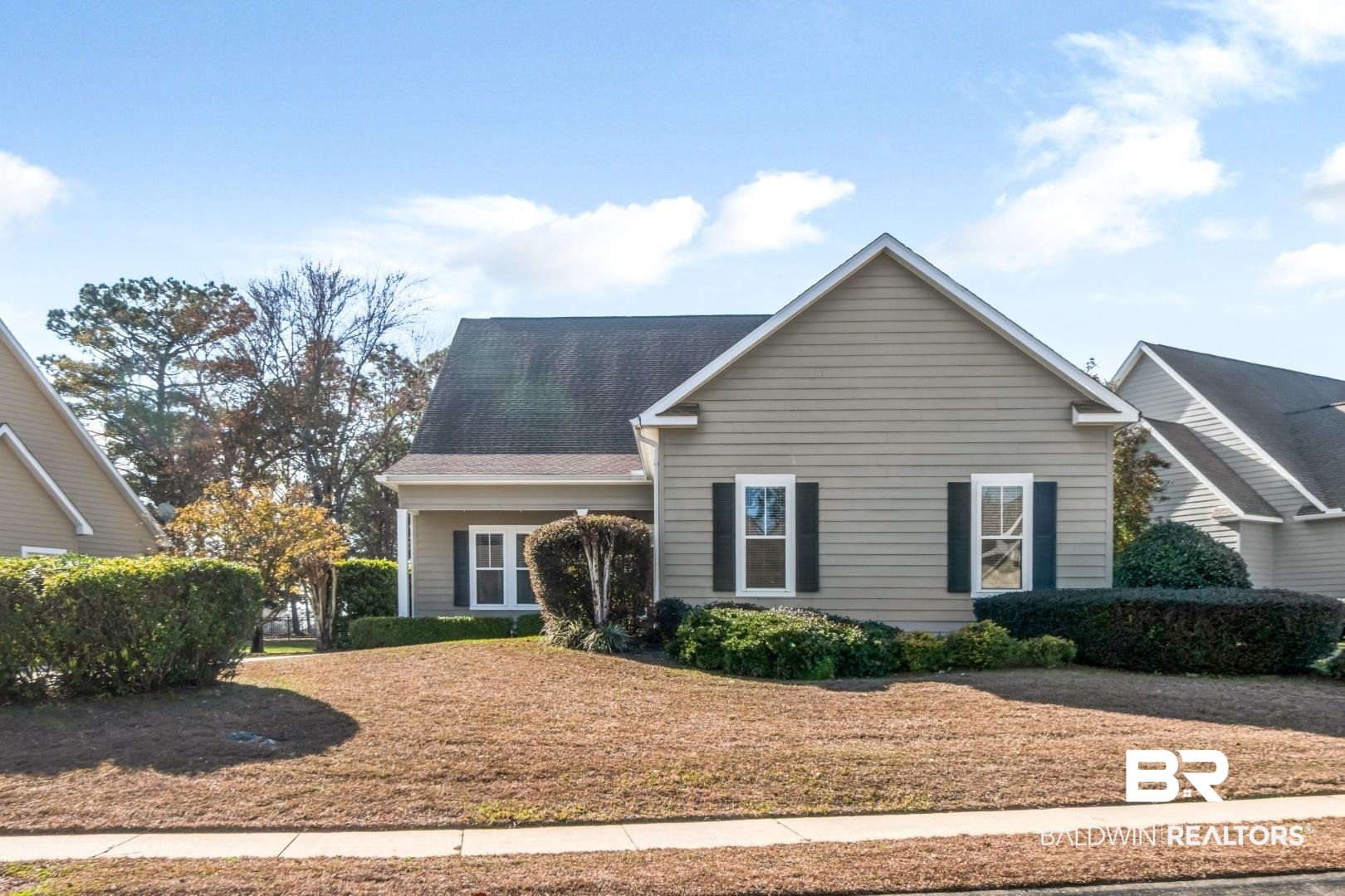 30585 Pine Court Daphne, AL 36527 - Photo 26 of 49 View of front facade featuring a front yard and a shingled roof