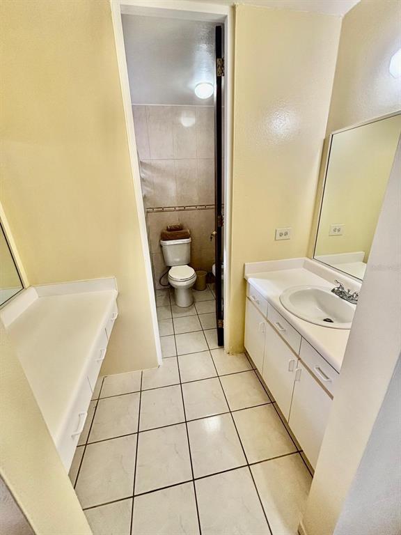 1 St Rio Grande, Unit B6 Rio Grande, PR 00745 - Photo 22 of 47 a bathroom with a sink a toilet and shower