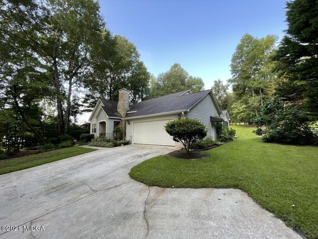 1480 Johnson Road Macon, GA 31220 - Photo 33 of 75 a view of a house with a yard and tree s
