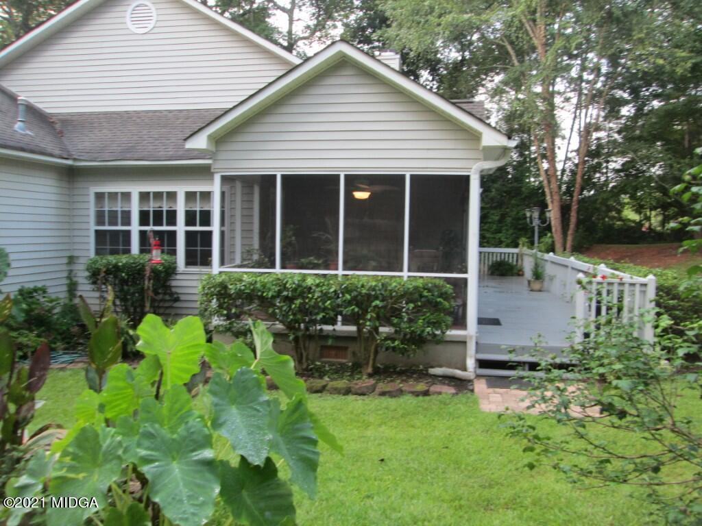1480 Johnson Road Macon, GA 31220 - Photo 40 of 75 a front view of a house with garden and plants