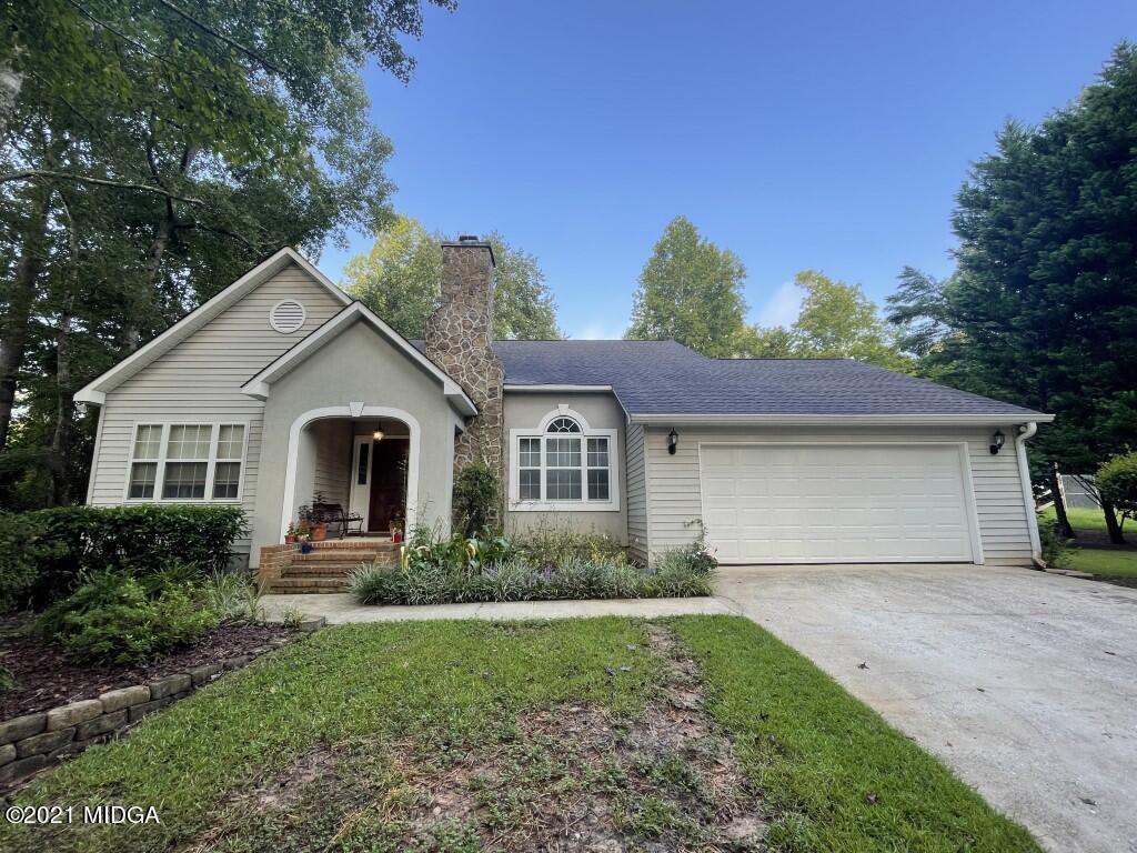1480 Johnson Road Macon, GA 31220 - Photo 44 of 75 a front view of a house with a garden