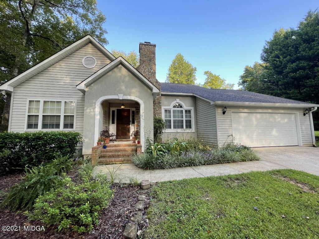 1480 Johnson Road Macon, GA 31220 - Photo 51 of 75 a front view of a house with garden
