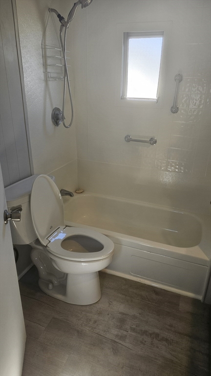 8 Gerald Drive Middleboro, MA 02346 - Photo 16 of 17 a white toilet sitting next to a bath tub and a shower