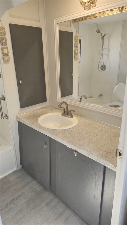 8 Gerald Drive Middleboro, MA 02346 - Photo 17 of 17 a bathroom with a sink and a mirror