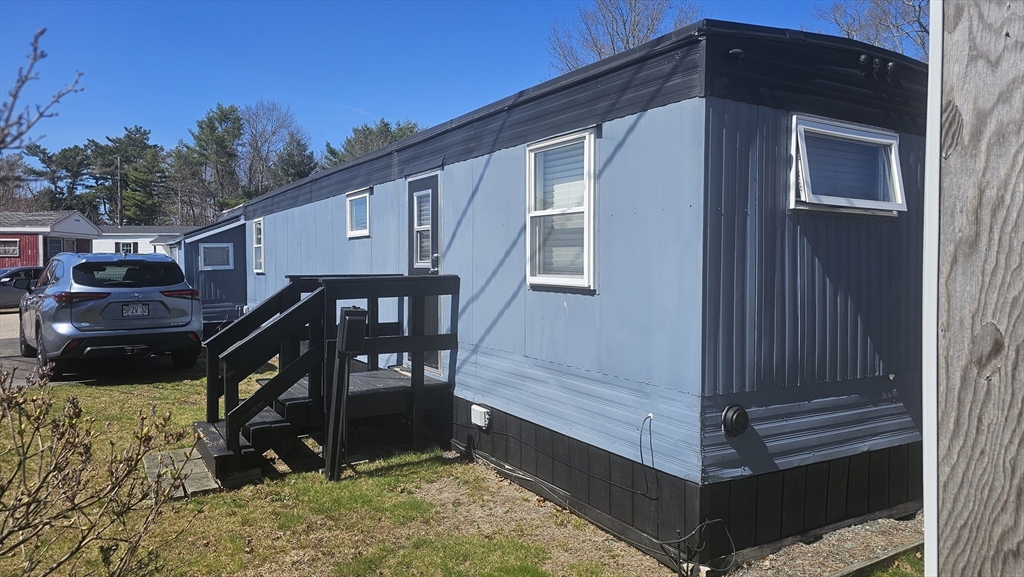 8 Gerald Drive Middleboro, MA 02346 - Photo 2 of 17 a view of a house with a deck