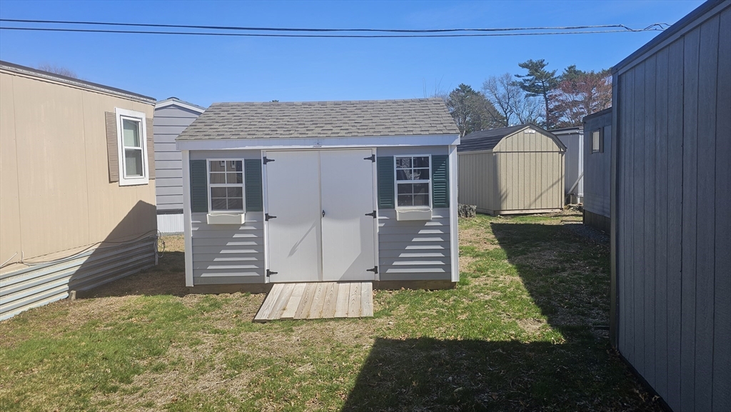 8 Gerald Drive Middleboro, MA 02346 - Photo 3 of 17 a front view of a house with a yard