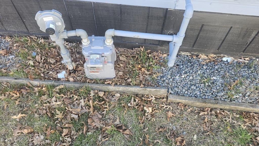 8 Gerald Drive Middleboro, MA 02346 - Photo 4 of 17 a close view of water heater room