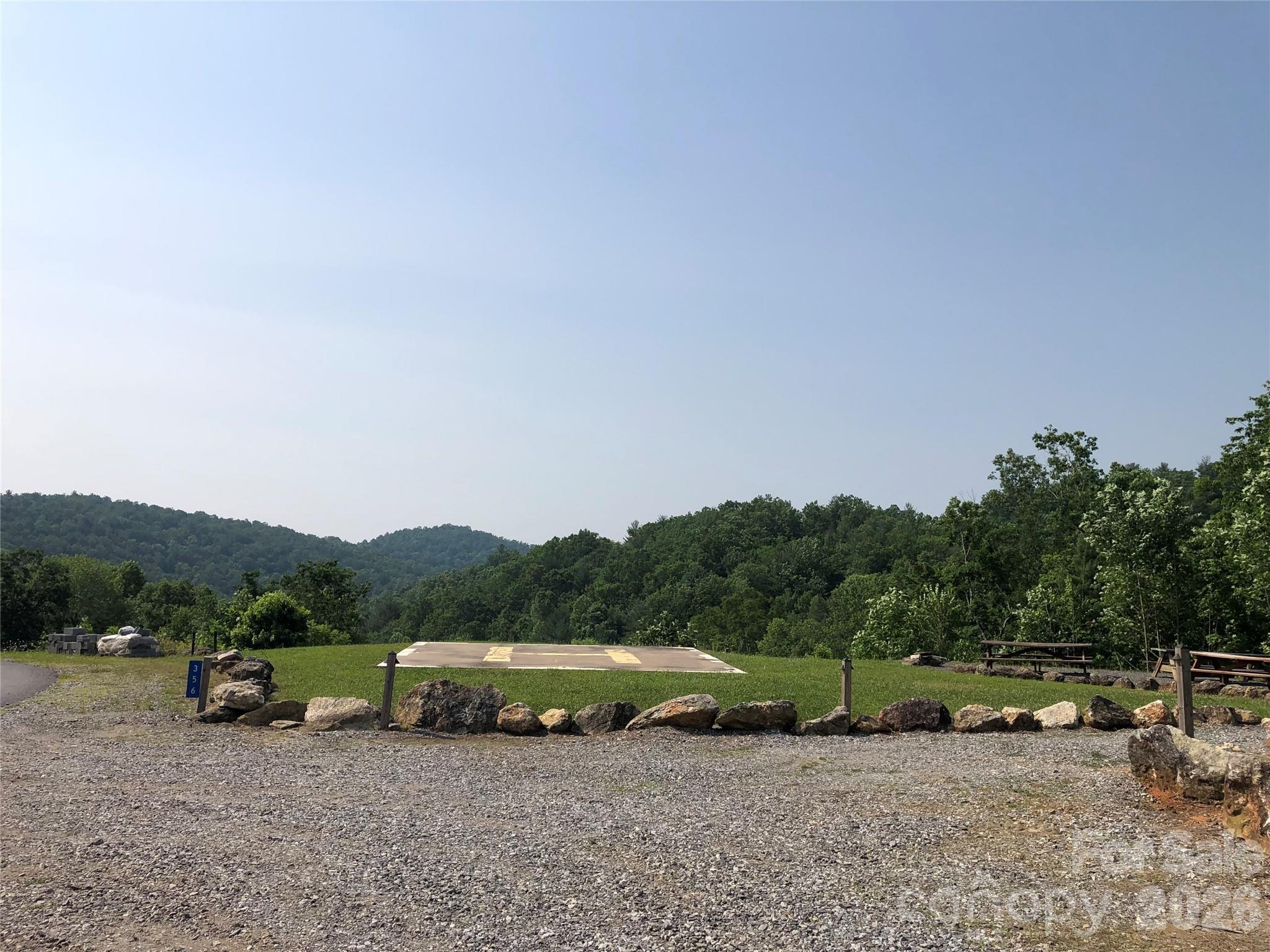 Tbd Staghorn Road, Unit 160 & 161 Purlear, NC 28665 - Photo 42 of 46 a view of a yard with car parked