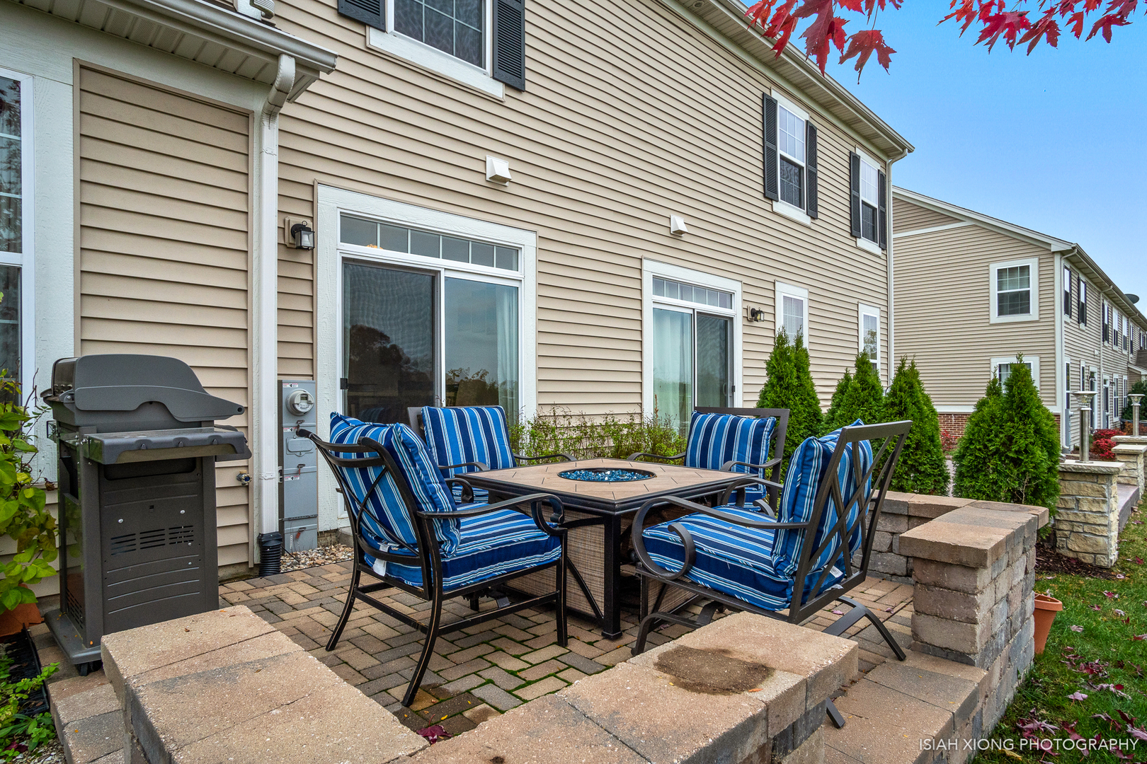 2964 Church Road Aurora, IL 60502 - Photo 15 of 16 a view of a chair and table in the back yard of the house