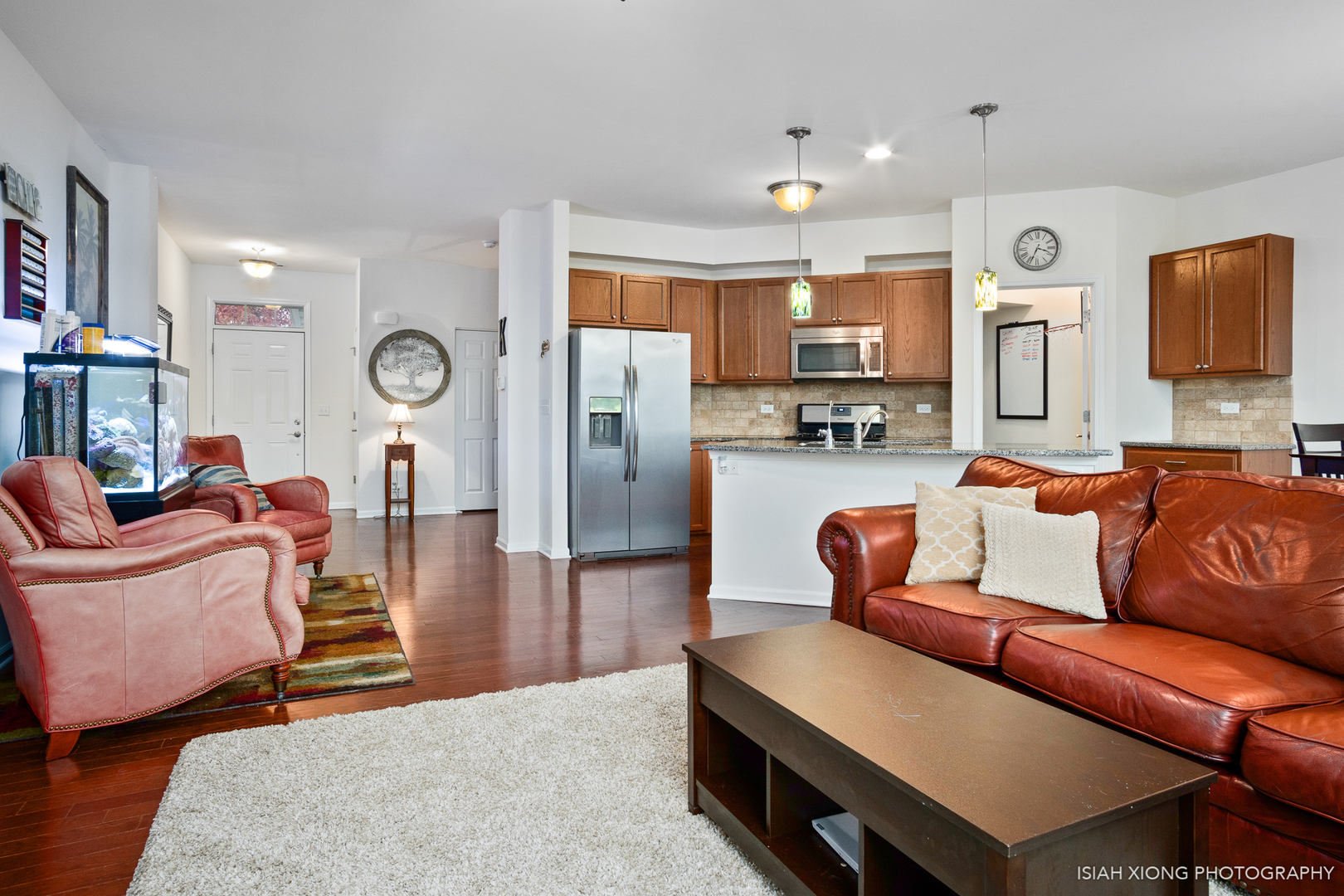 2964 Church Road Aurora, IL 60502 - Photo 4 of 16 a living room with furniture a wooden floor and a large window