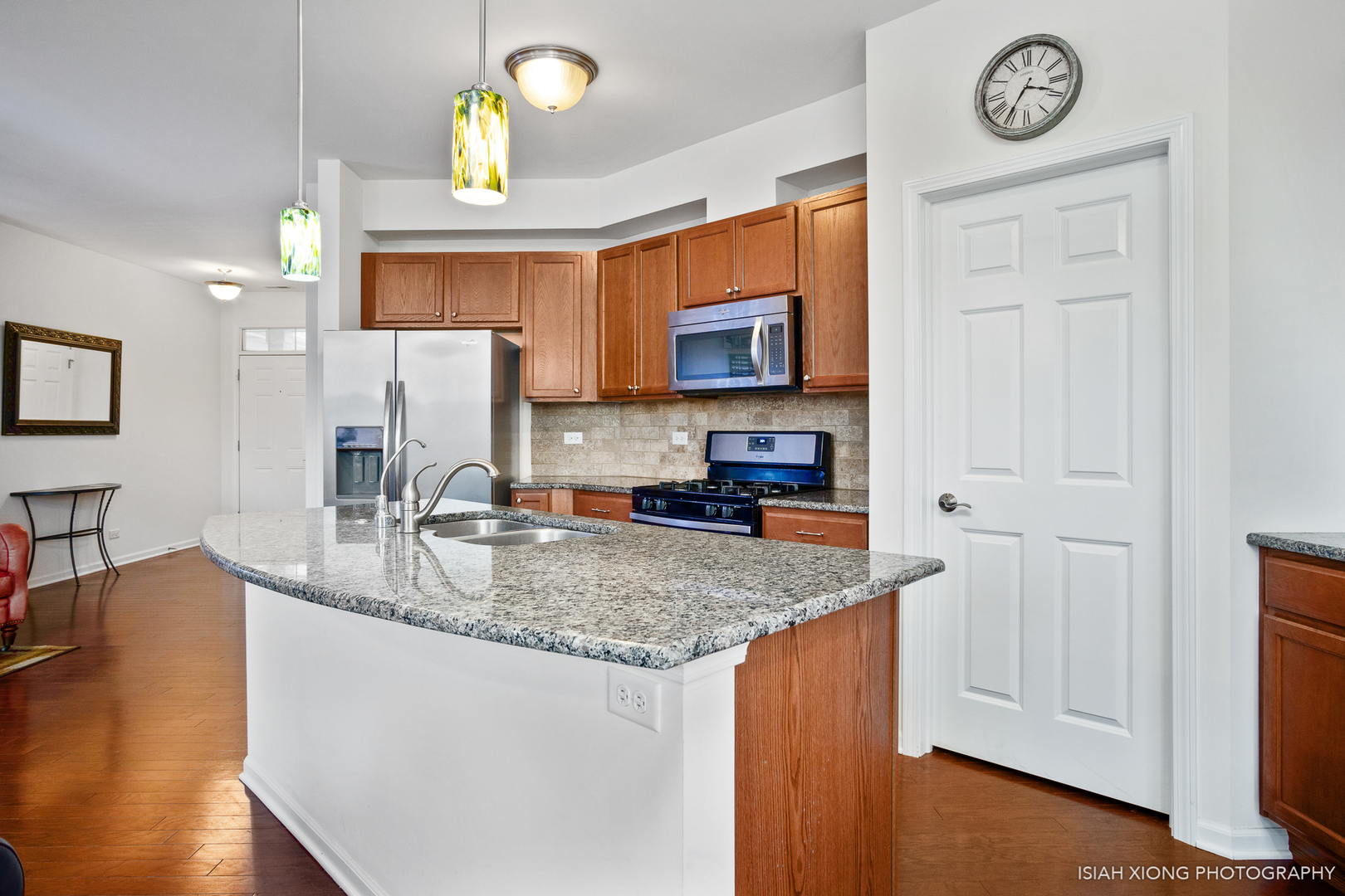 2964 Church Road Aurora, IL 60502 - Photo 5 of 16 a kitchen with stainless steel appliances granite countertop a sink a microwave cabinets and a dining table