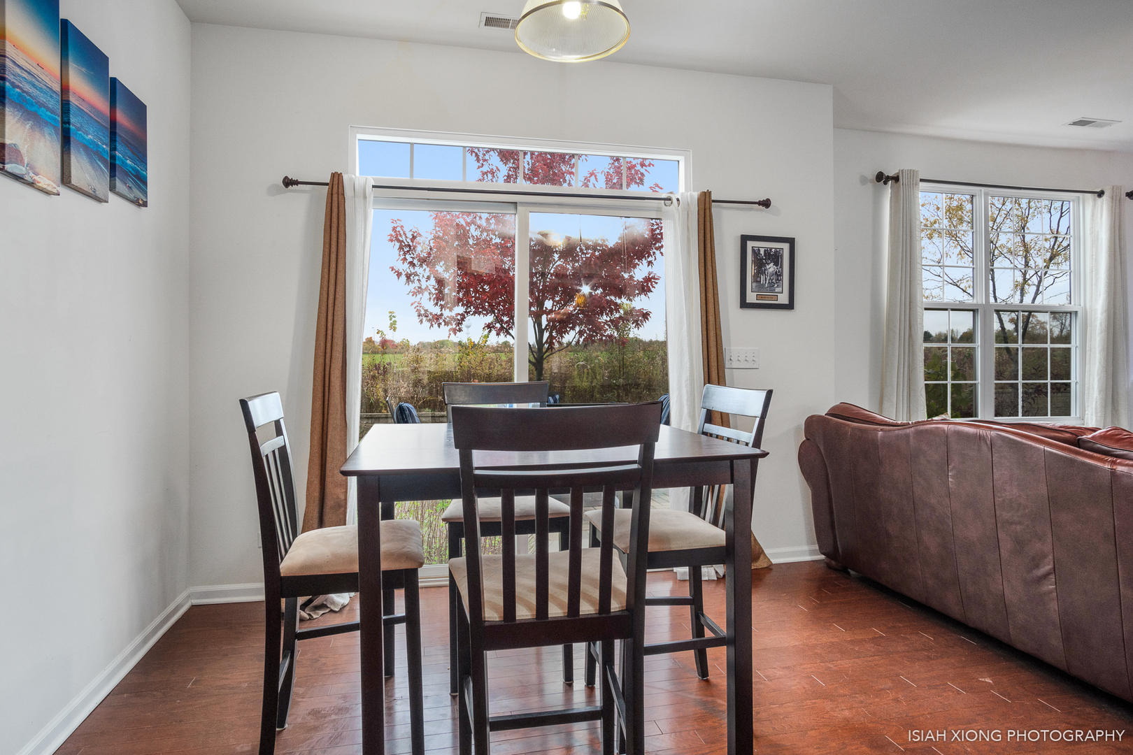 2964 Church Road Aurora, IL 60502 - Photo 6 of 16 a view of a dining room with furniture large window and wooden floor