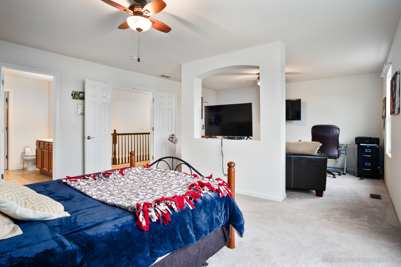 2964 Church Road Aurora, IL 60502 - Photo 9 of 16 a bedroom with a bed and a flat screen tv