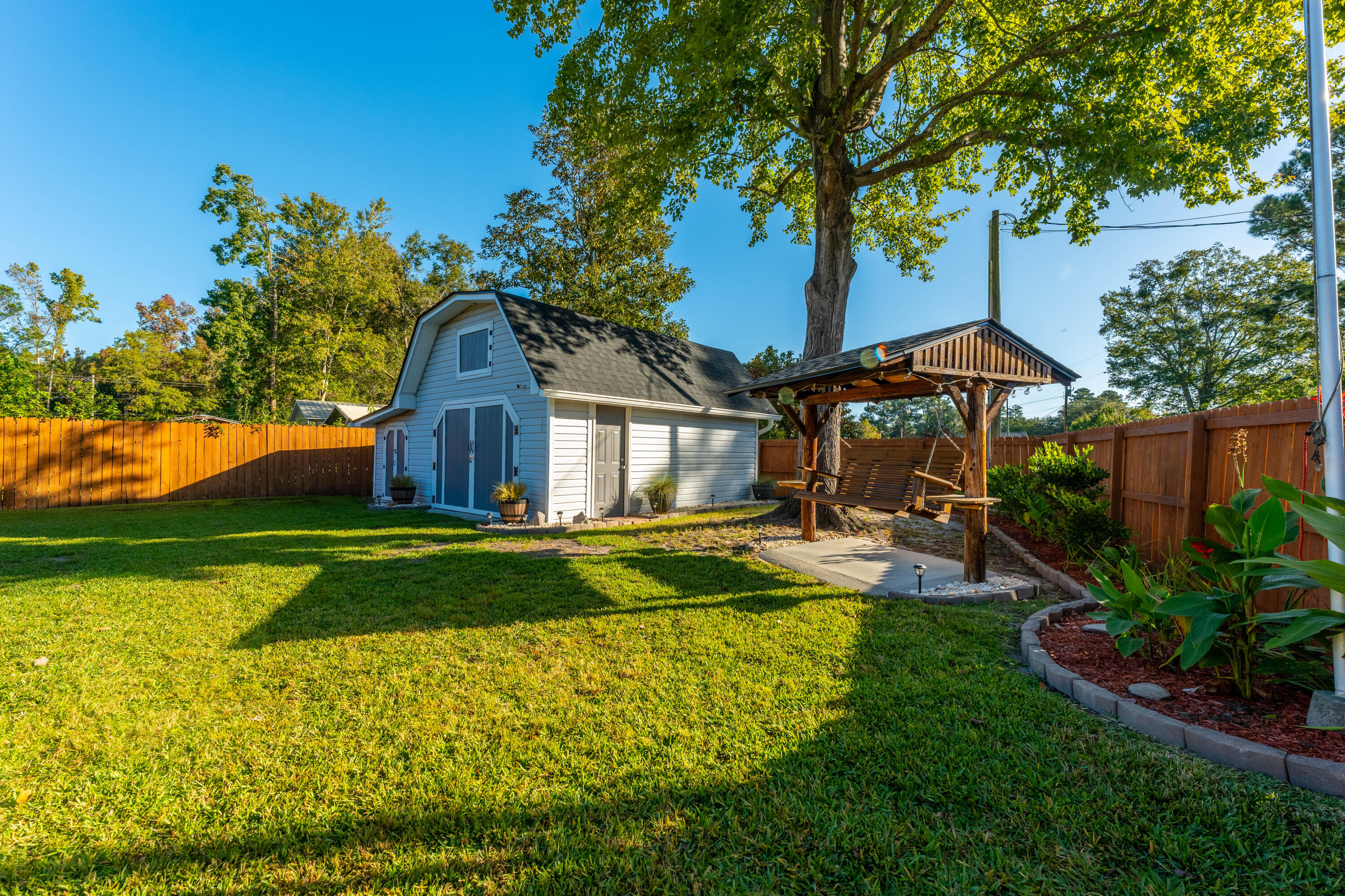 107 State Rd S-8-433 Moncks Corner, SC 29461 - Photo 26 of 38 Workshop and Swing