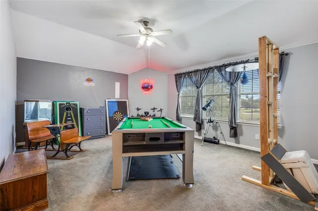 a room with furniture and a gym