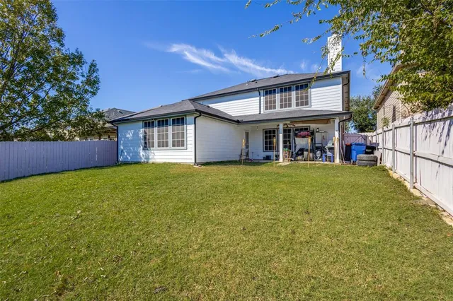 a house view with a garden space
