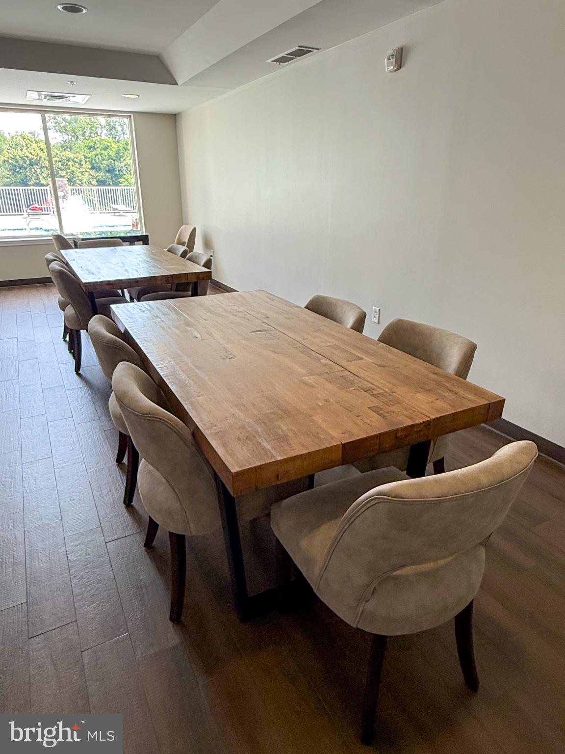 6301 Edsall Road, Unit 519 Alexandria, VA 22312 - Photo 32 of 33 Modern dining space with natural light.