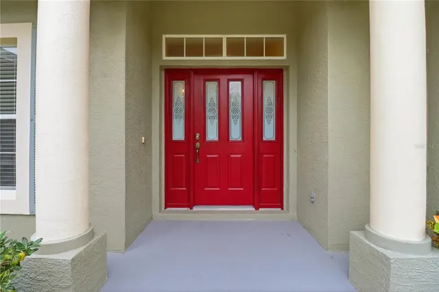 a view of a red door of the house