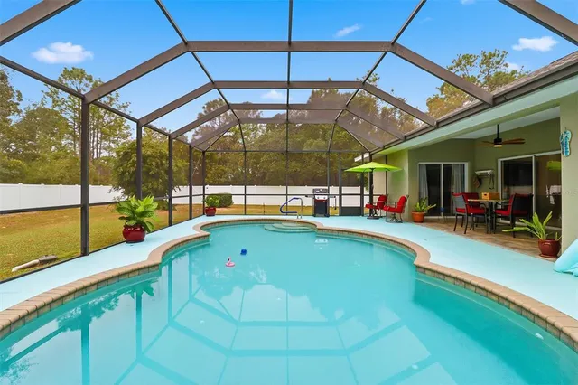 a indoor swimming pool with outdoor seating