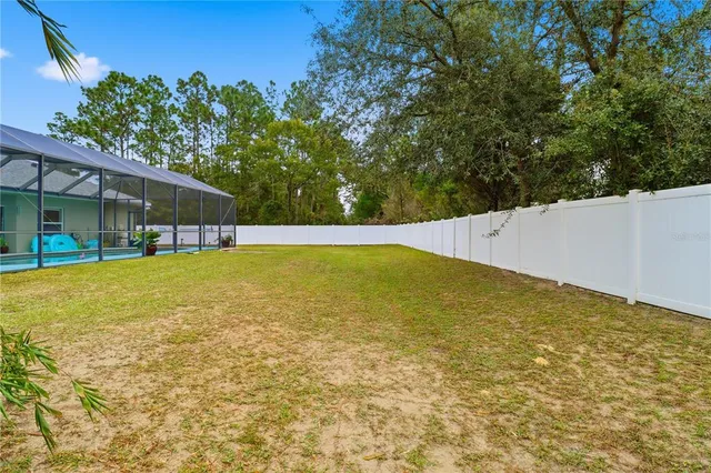 a view of an outdoor space and swimming pool