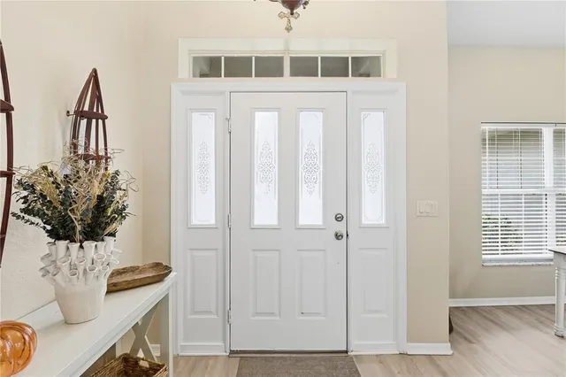 a view of table and chair in wooden floor