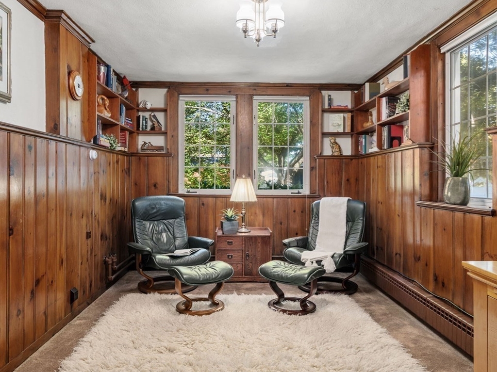 58 Country Club Road Newton, MA 02459 - Photo 11 of 27 a living room with furniture a rug and a window