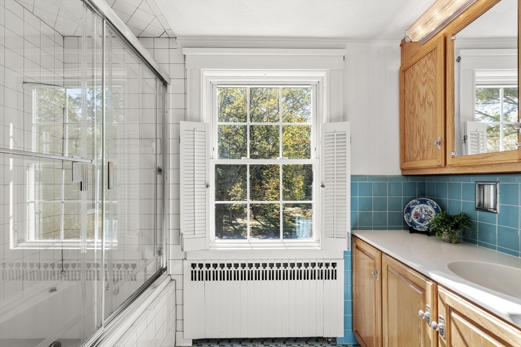 58 Country Club Road Newton, MA 02459 - Photo 18 of 27 a kitchen with a window a sink and a cabinets