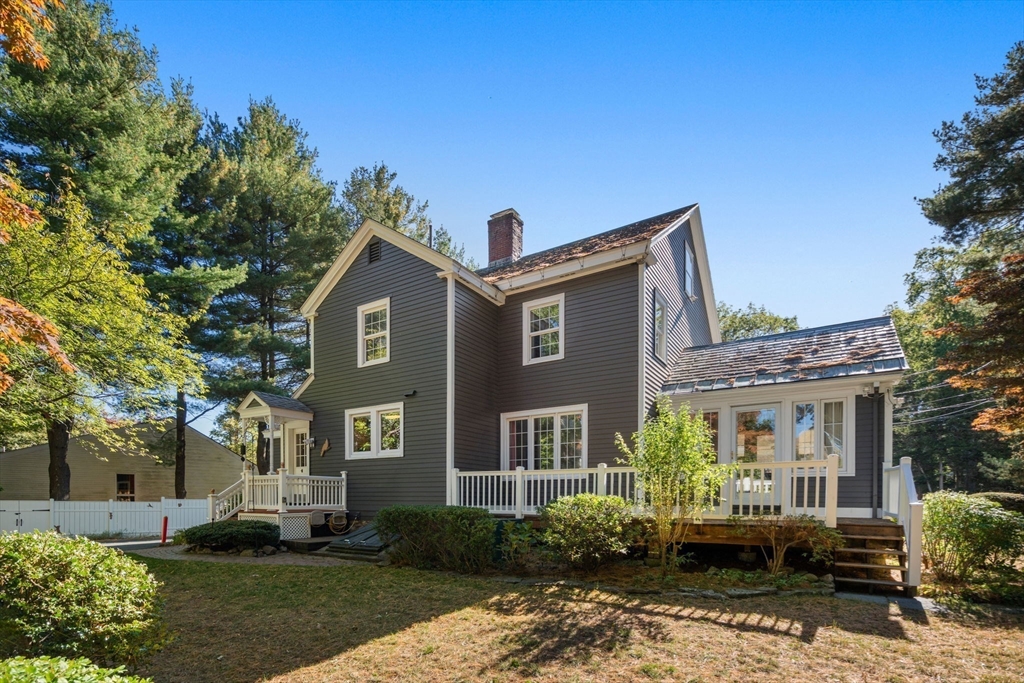 58 Country Club Road Newton, MA 02459 - Photo 23 of 27 a front view of a house with a yard