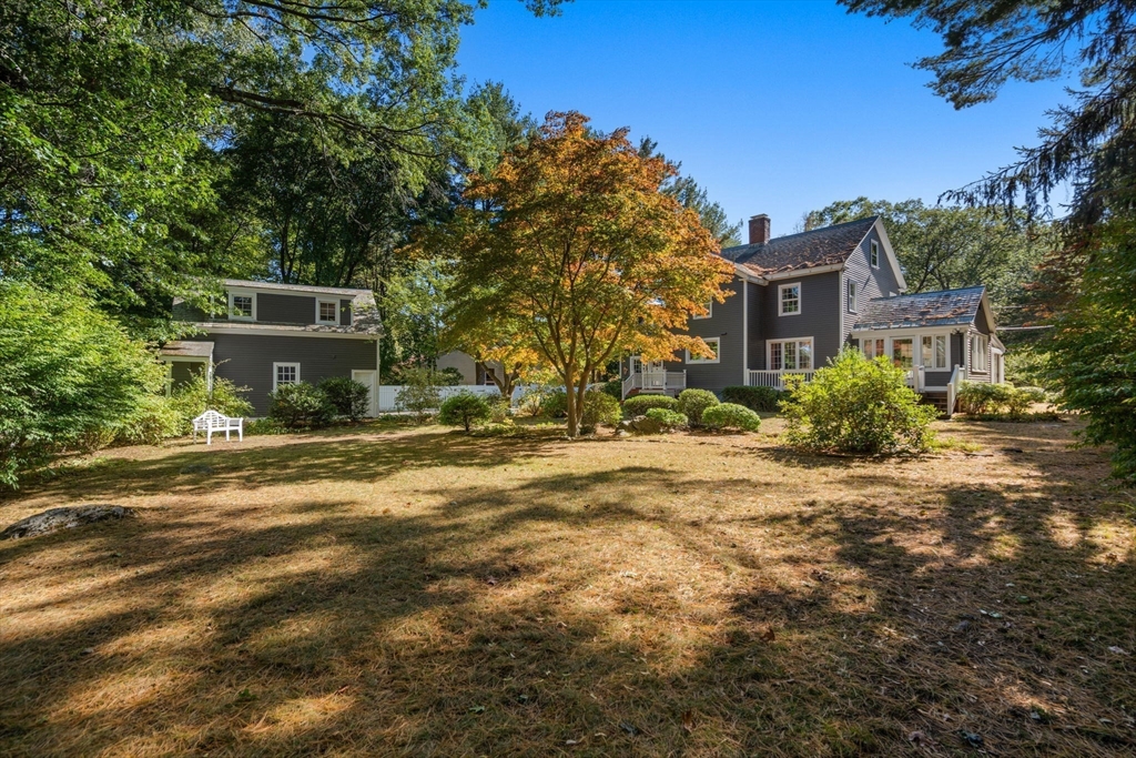 58 Country Club Road Newton, MA 02459 - Photo 25 of 27 a front view of a house with a yard
