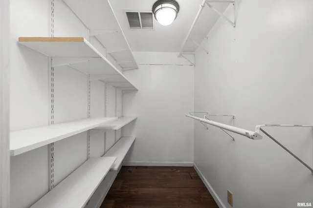 a hallway with cabinets