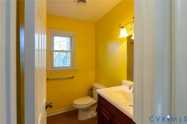 a bathroom with a sink and a toilet