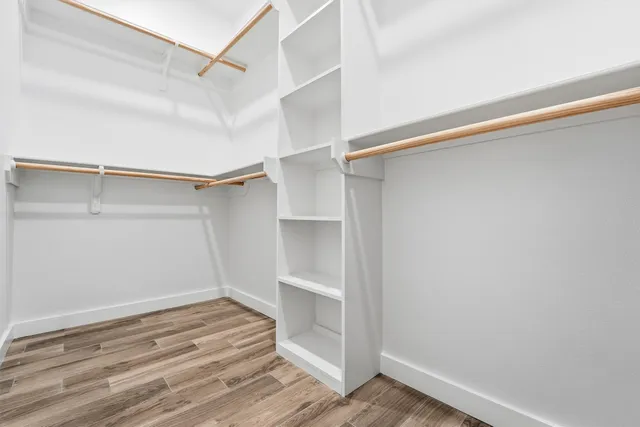 a view of an empty walk in closet
