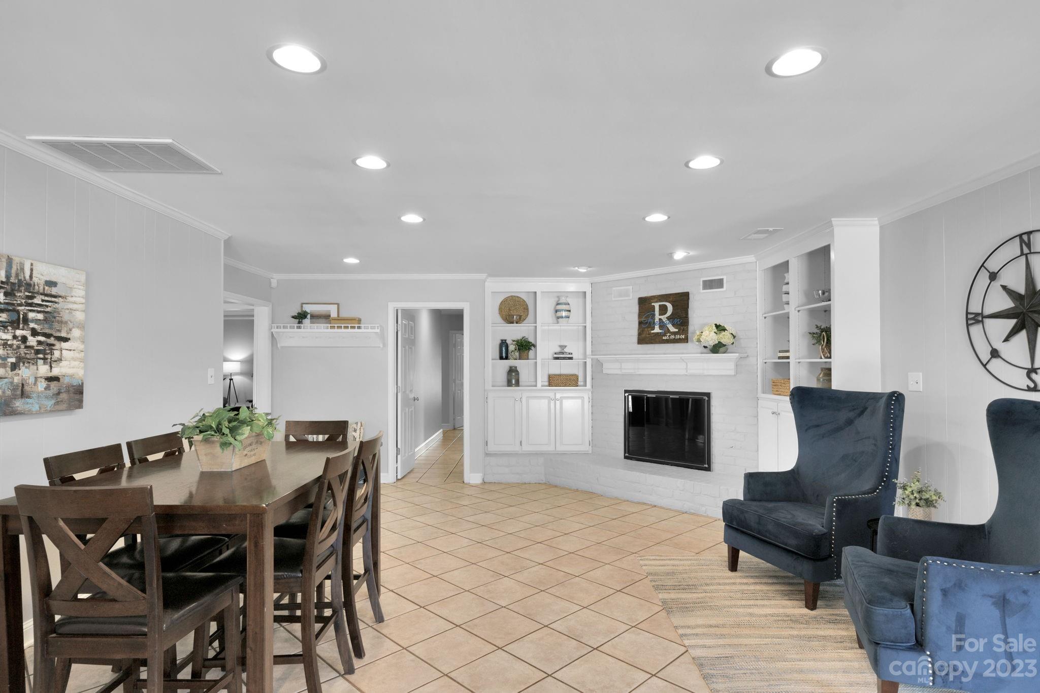 1916 Cox Road Matthews, NC 28104 - Photo 13 of 47 a living room with furniture and a fireplace