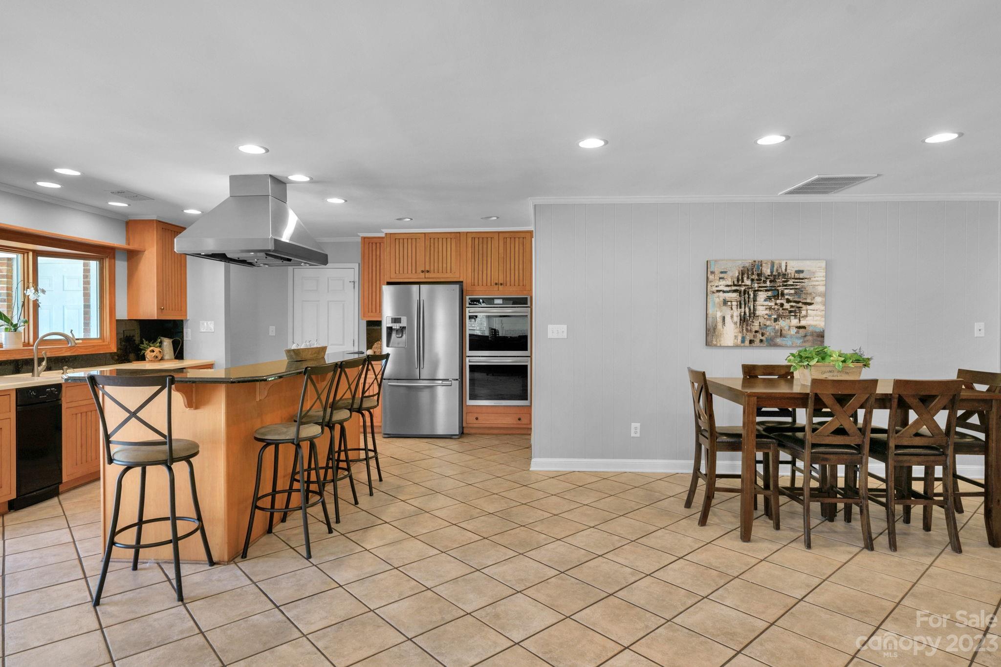 1916 Cox Road Matthews, NC 28104 - Photo 19 of 47 a view of a dining room with furniture