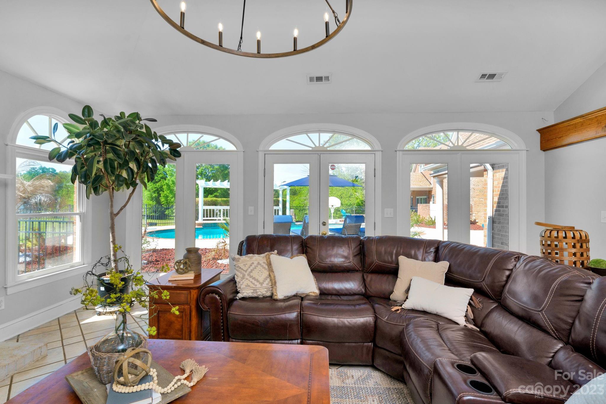 1916 Cox Road Matthews, NC 28104 - Photo 22 of 47 a living room with furniture and a large window