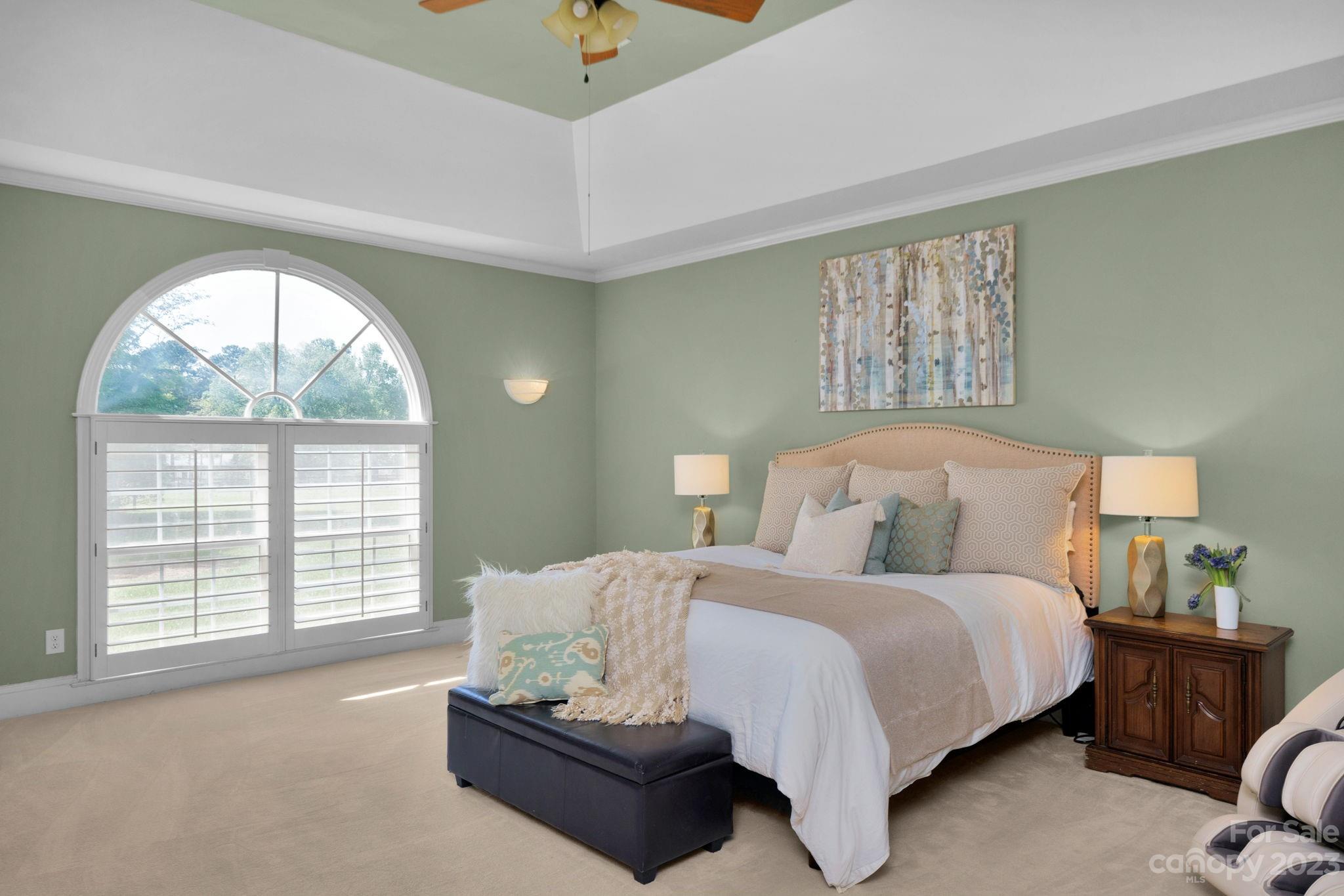1916 Cox Road Matthews, NC 28104 - Photo 23 of 47 a bedroom with bed and a large window