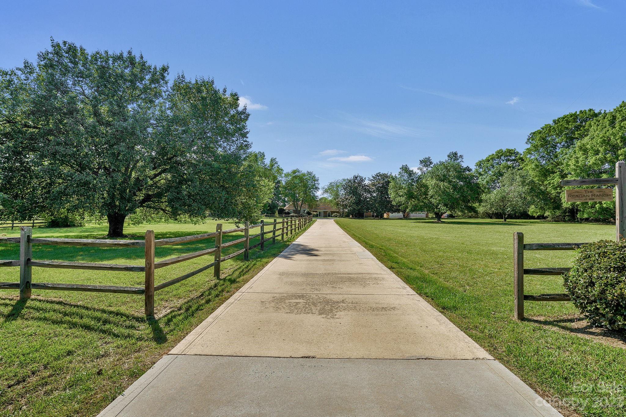 1916 Cox Road Matthews, NC 28104 - Photo 3 of 47 a view of park with large trees