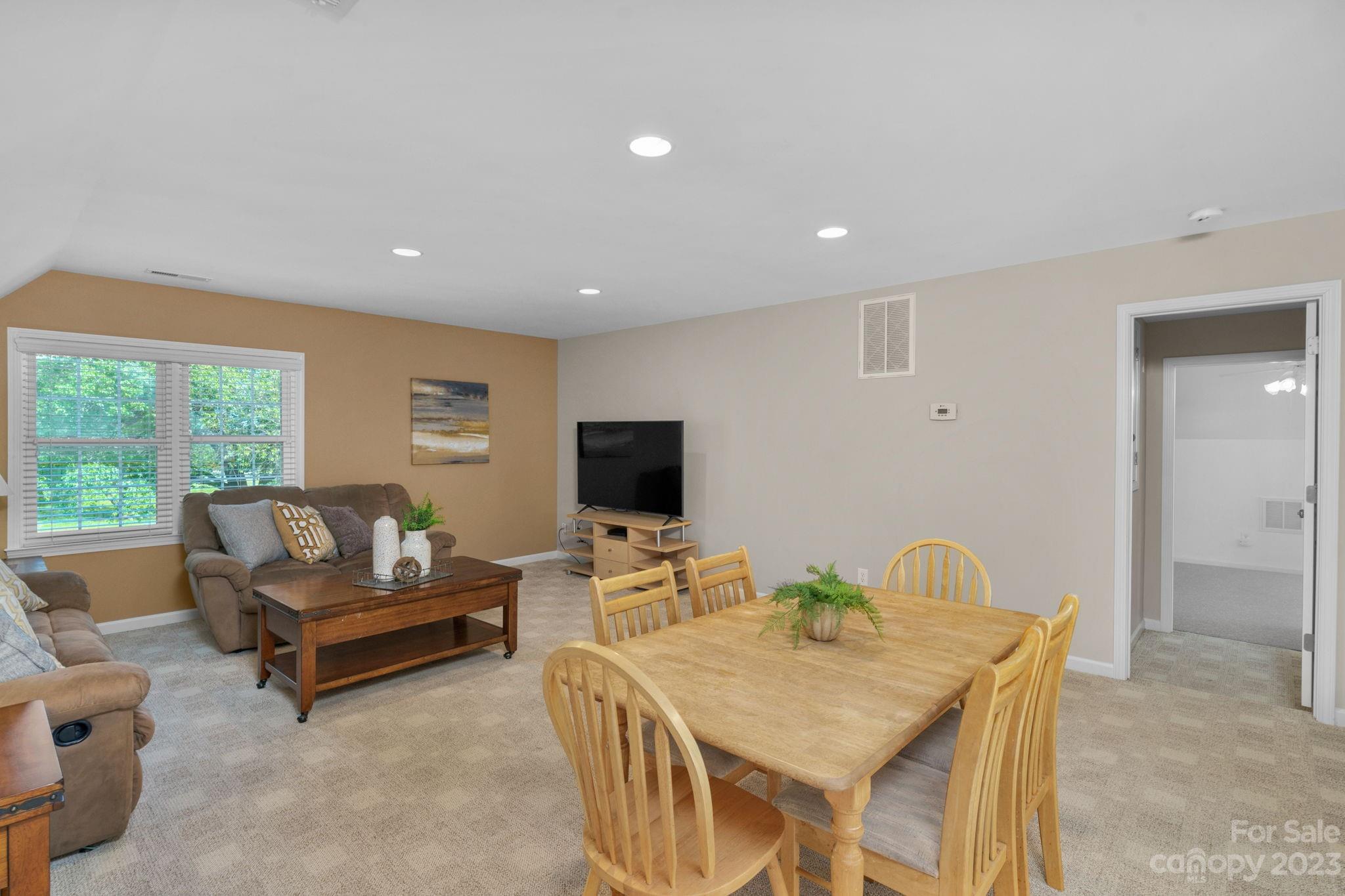 1916 Cox Road Matthews, NC 28104 - Photo 35 of 47 a living room with furniture and a flat screen tv