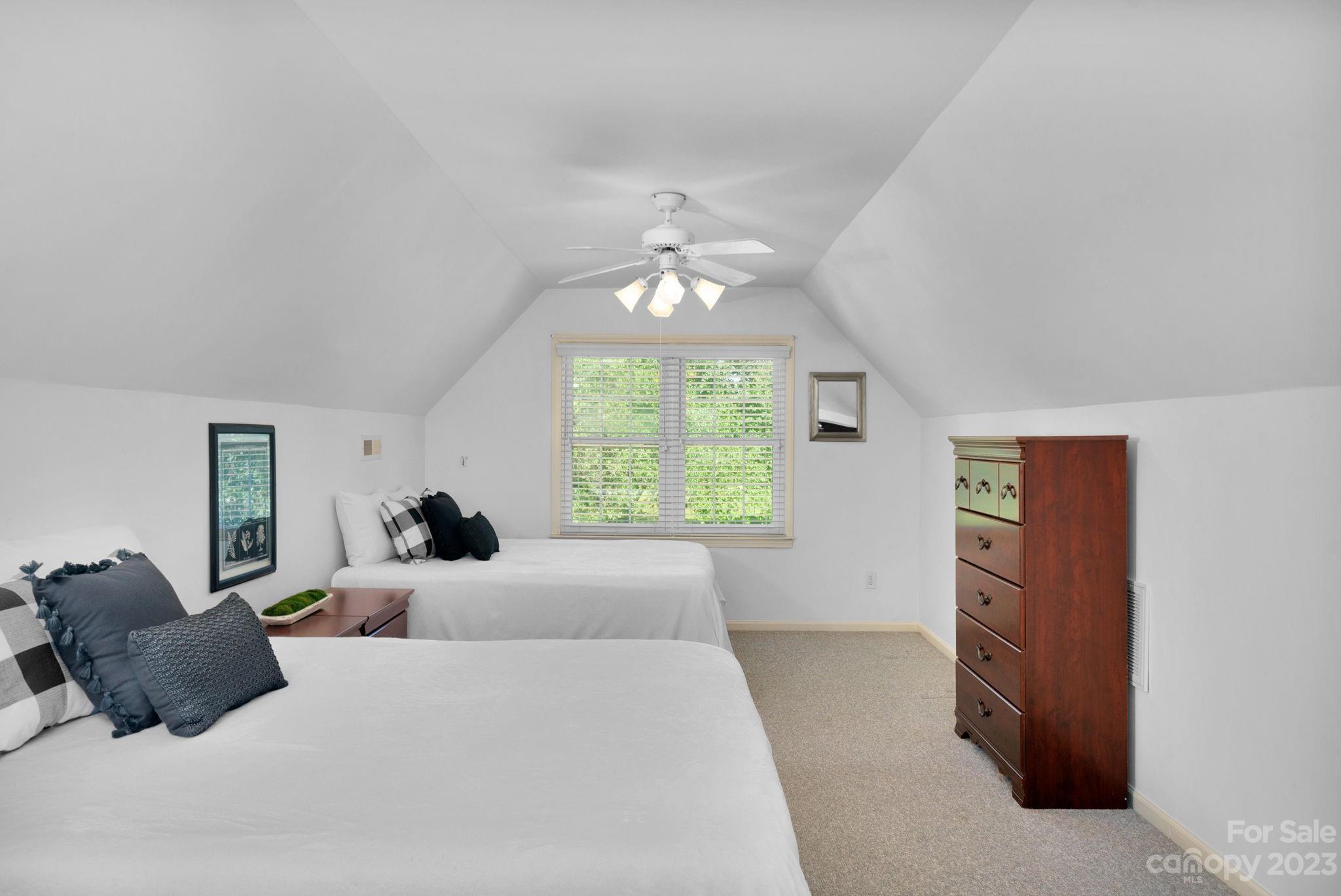 1916 Cox Road Matthews, NC 28104 - Photo 36 of 47 a bed room with a bed and a large window