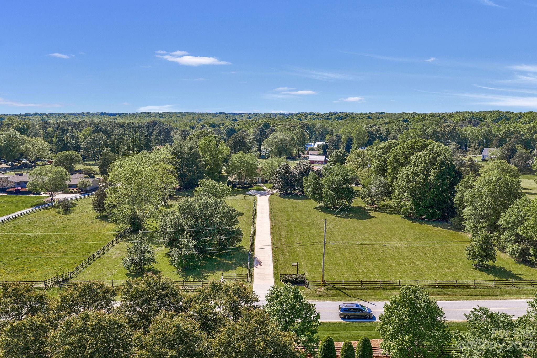 1916 Cox Road Matthews, NC 28104 - Photo 41 of 47 an aerial view of a houses with a yard