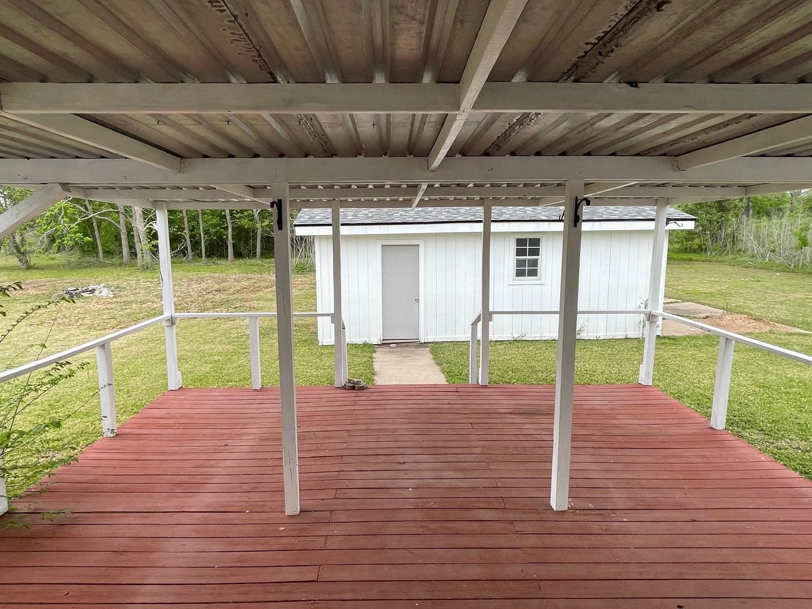 335 Carroll Road Richmond, TX 77469 - Photo 22 of 25 a view of a backyard