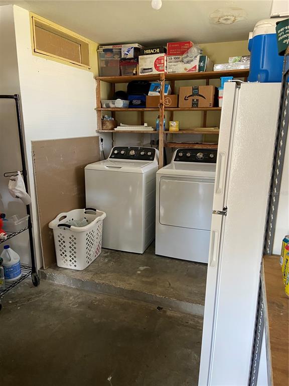 5343 Bluepoint Drive Port Richey, FL 34668 - Photo 13 of 28 a room with storage and utility